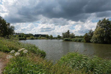 Landscape photo of a dramatic cloud cover over the Molsbroek nature reserve in Belgium