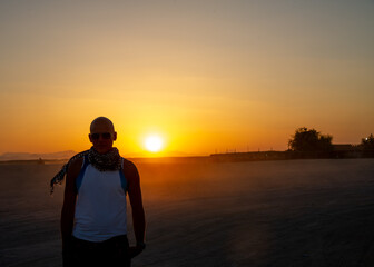 Fototapeta premium Portrait of a tourist at sunset