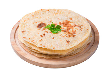 Chapati tortillas with fresh herbs are isolated in close-up on a white background. Traditional Indian flatbreads. Side view, close-up