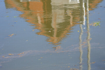 reflection of a house in a river in Chile