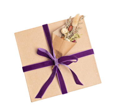 Gift box with velvet ribbon and dried flowers bouquet. Creative and zero waste holidays present