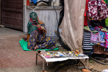 Hindu woman with her face covered at the market