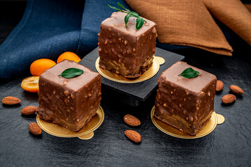 Delicious chocolate brownie with nuts on the table.