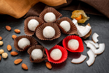 Coconut candies covered with coconut crumbs.