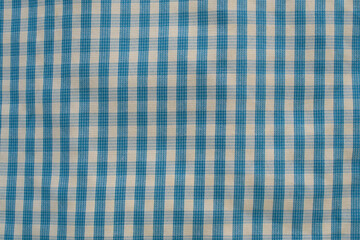Scots pattern fabric closeup for background.