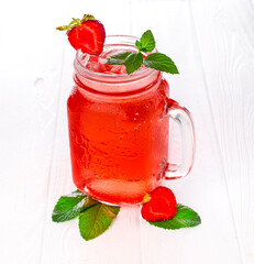 Cold strawberry lemonade in mason jar isolated