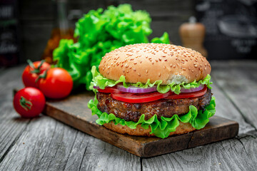 Fresh tasty burger on wood table
