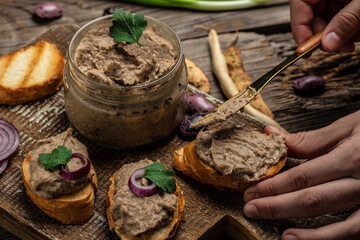 Toasts bread with beans paste, Mexican cuisine pate of beans in glass jar. healthy vegetarian food,...