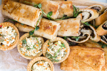 Olivier salad tartlet, mushroom strudel and chicken and vegetable puff