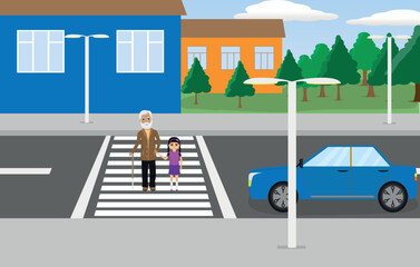 Obraz na płótnie Canvas The girl helps the old man to cross the road.