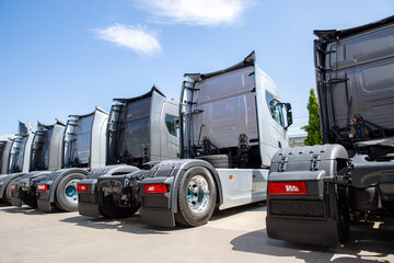 New heavy trucks in truck store, trucks lined up
