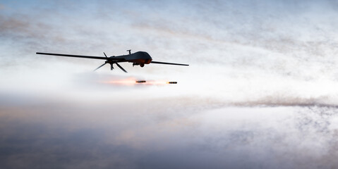Fototapeta na wymiar Military combat drone UAV launching missiles