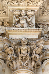 Fototapeta na wymiar Santa Croce church, Lecce. Facade sculptures.