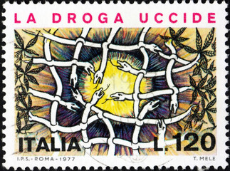 Postage stamp Italy 1977 shows snakes forming net, fight against drug abuse