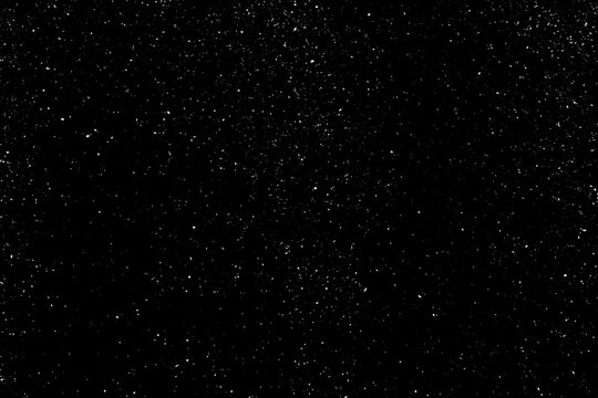 Chaotic white star bokeh on a isolated black background. falling blurry bokeh snow overlay, starry sky. white spots on black background, white drops and spots. abstraction © Илья Подопригоров