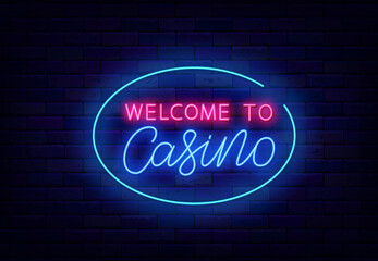 Welcome to casino neon sign. Greeting card on brick wall. Casino emblem. Shiny calligraphy. Vector illustration