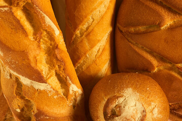 Different types of bread with warm colors