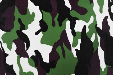 Green black camouflage pattern fabric background texture. military and hunting clothes