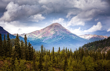 Dramatic louds above the mountain peaks of the Denali National Park, Alaska