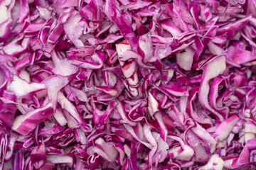 Sliced red cabbage background texture. close-up