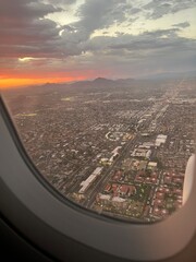 Fototapeta na wymiar airplane window sunset 