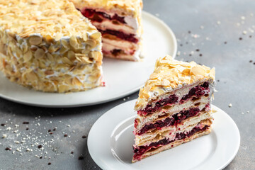 cake with cherries and white cream. delicious sweet dessert piece of cake