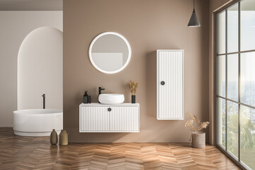 Modern bathroom interior with beige walls, white basin with oval mirror, bathtub and parquet floor. Minimalist beige bathroom with modern furniture. 3D rendering