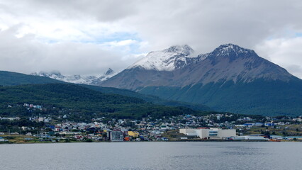 Fototapeta na wymiar Snow capped Martial Mountains above Ushuaia, Argentina, with the Beagle Channel in the foreground