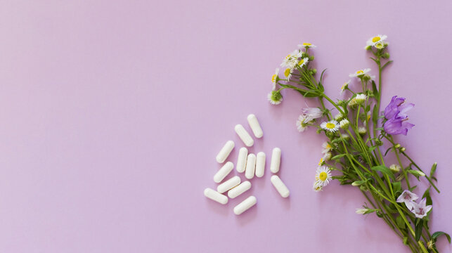 Allegry concept, flowers and pills