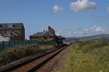 Fototapeta na wymiar the railway line at Borth that travels to Aberystwyth