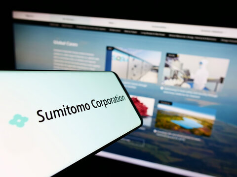 Stuttgart, Germany - 08-27-2022: Smartphone with logo of Japanese company Sumitomo Corporation on screen in front of business website. Focus on center of phone display.