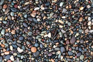 Pebbles on the beach. Pebbles texture.