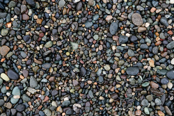 Pebbles on the beach. Pebbles texture.