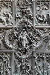 Milan Duomo door relief sculptures.