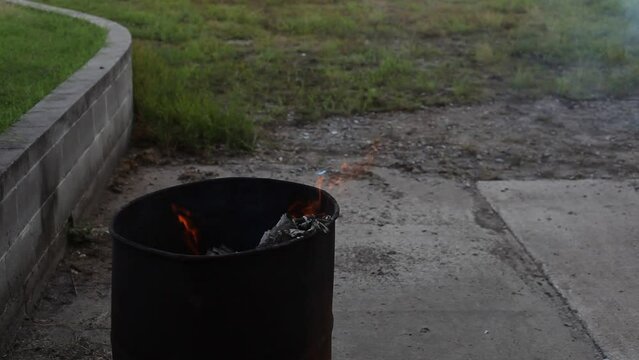 Dumpster Fire Large Orange Flames Lick Out of Trashcan Fire