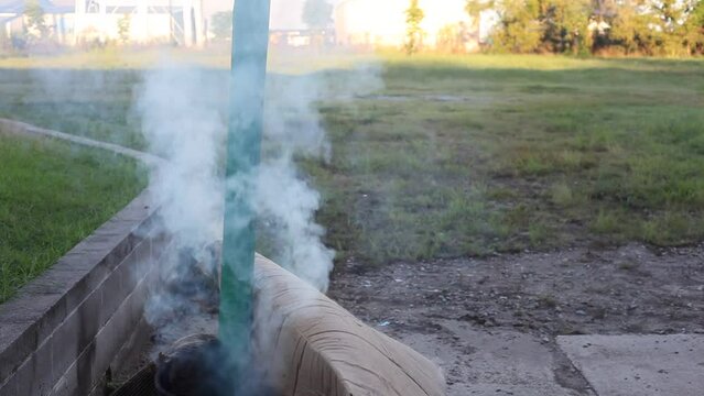 Dumpster Fire Large Orange Flames Lick Out of Trashcan Fire