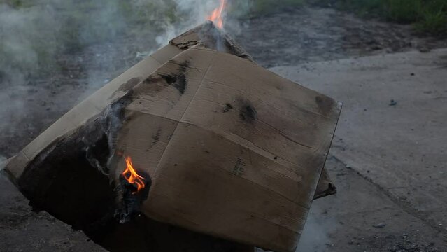 Dumpster Fire Large Orange Flames Lick Out of Trashcan Fire