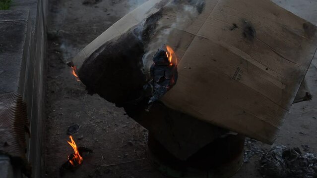Dumpster Fire Large Orange Flames Lick Out of Trashcan Fire