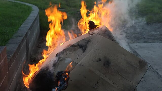 Dumpster Fire Large Orange Flames Lick Out of Trashcan Fire