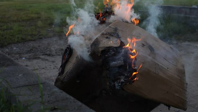 Dumpster Fire Large Orange Flames Lick Out of Trashcan Fire