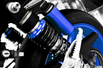 Fototapeta na wymiar Close up of springs, shock absorbers motorcycle big bike. Rad shock Absorbers motorcycle . focus on suspension.