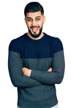 Young arab man with beard with arms crossed gesture clueless and confused expression. doubt concept.