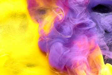Multicolored yellow lilac smoke abstract background, acrylic paint underwater explosion