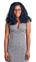 Beautiful african american woman wearing business dress and glasses looking positive and happy...
