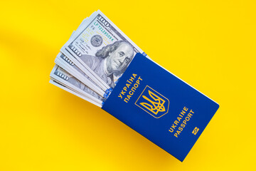 ukrainian passports and 100 dollar banknotes