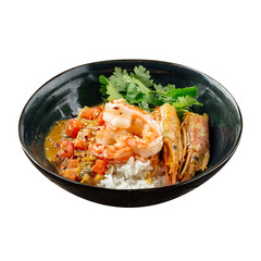 Isolated bowl of curry rice with langoustines