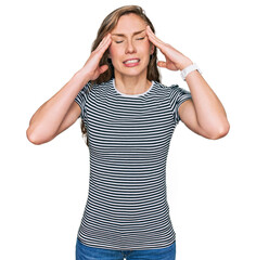 Fototapeta premium Young blonde woman wearing casual clothes with hand on head for pain in head because stress. suffering migraine.