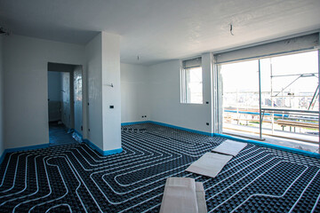 Underfloor heating. Underfloor heating system in a modern building under construction.