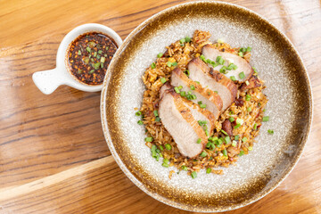 Thai food. fried rice spicy sour prawn served with grilled pork neck. 
