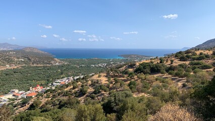 Fototapeta na wymiar View of Mirabello bay, Crete, Greece. Turquoise waters of mediterranean sea with cliffs.